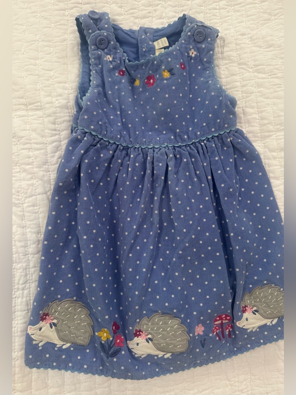 Blue cord jumper with appliquéd porcupines. Size 12/18 mo. Jojo maman Bebe.